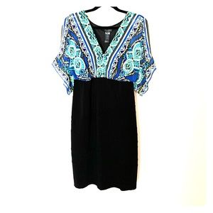 Black skirt, flowy top, mid length dress